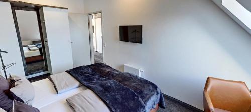TV a/nebo společenská místnost v ubytování Boardinghouse Emden