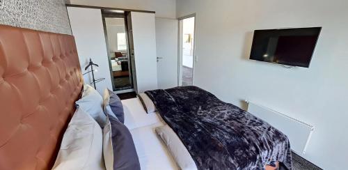 Postel nebo postele na pokoji v ubytování Boardinghouse Emden