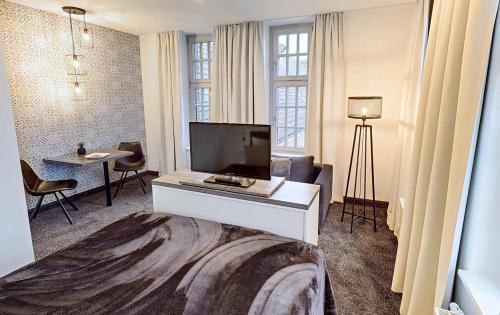 Postel nebo postele na pokoji v ubytování Boardinghouse Emden
