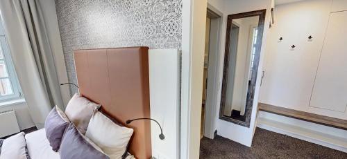Postel nebo postele na pokoji v ubytování Boardinghouse Emden