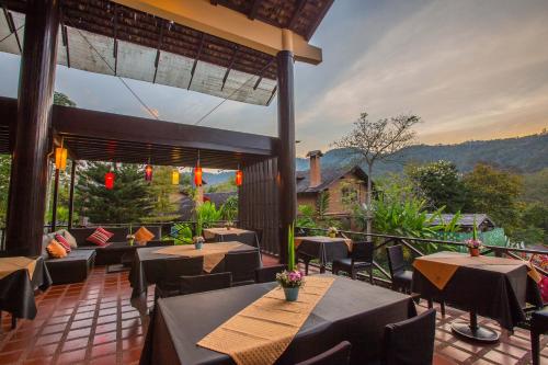 En restaurant eller et spisested på Belle Villa Resort, Chiang Mai