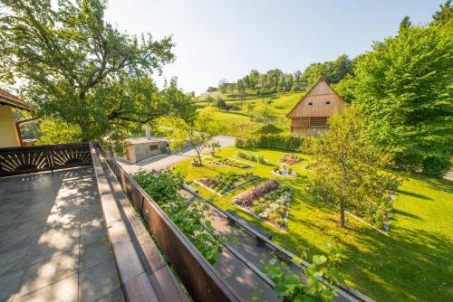 an overhead view of a garden on a balcony at Adventure Farm in Štore