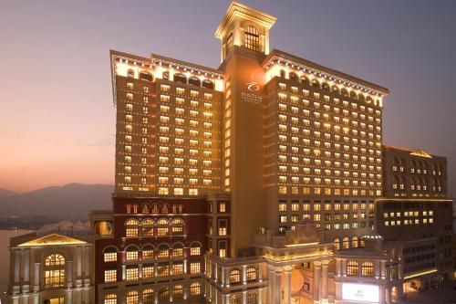 a large building with lights on top of it at Sofitel Macau At Ponte 16 in Macau
