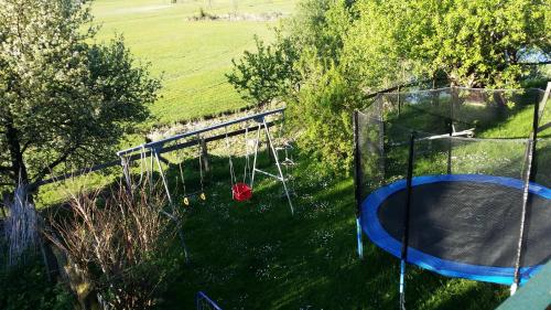 an overhead view of a batting cage in a field at Apartments Teglbauernhof, Hütte, Chalet, Mobilheim, Appartement, Ferienwohnung, Pension, Urlaub in Uttendorf