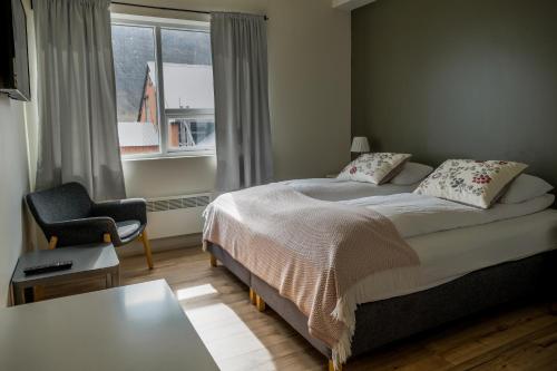 Postel nebo postele na pokoji v ubytování Harbour Inn - Guesthouse