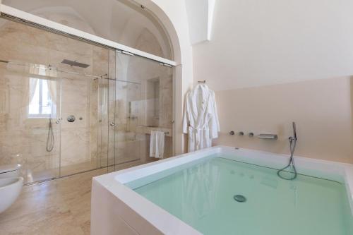 Kylpyhuone majoituspaikassa Palazzo Mascetti Executive Rooms