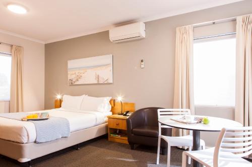 Cama o camas de una habitación en Kings Park Motel