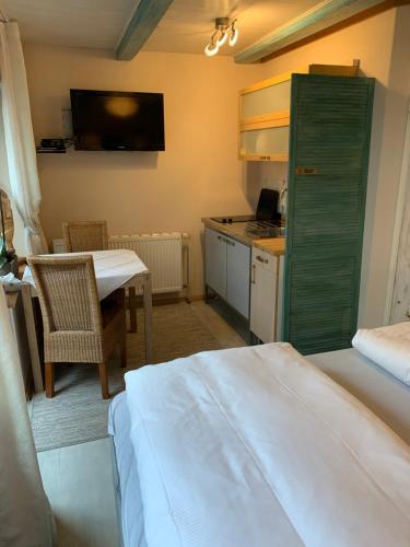 Postel nebo postele na pokoji v ubytování Gästehaus Kleiner Muck