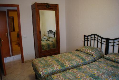 Postel nebo postele na pokoji v ubytování Casa Colombo - Theater Home