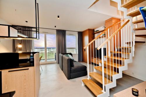 Televisyen dan/atau pusat hiburan di BlueApart Apartamenty Na Plaży Jastarnia