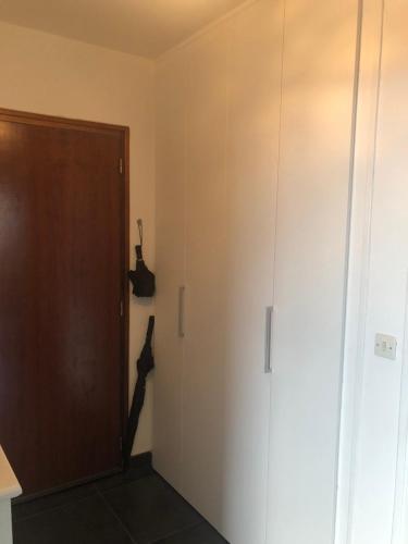 a room with a closet and a door at Carpe Diem in Le Val-André