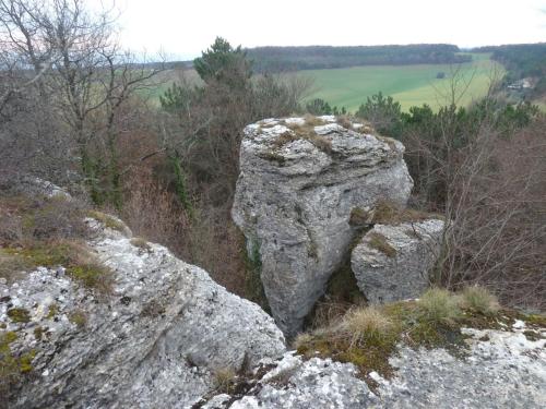 a large rock on the side of a mountain at Le Flav - Charmant appartement à 10 mn de Dijon in Flavignerot