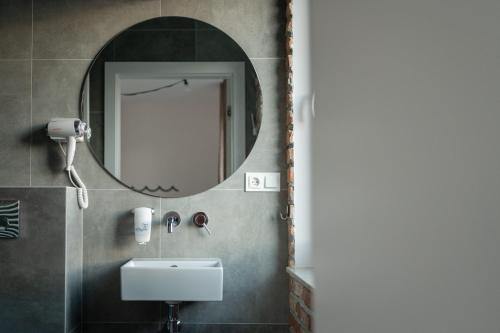 Ein Badezimmer in der Unterkunft Łydynia