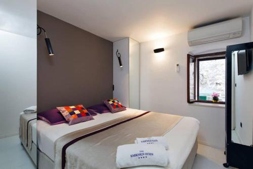 Posteľ alebo postele v izbe v ubytovaní Boutique old town house Karkovich