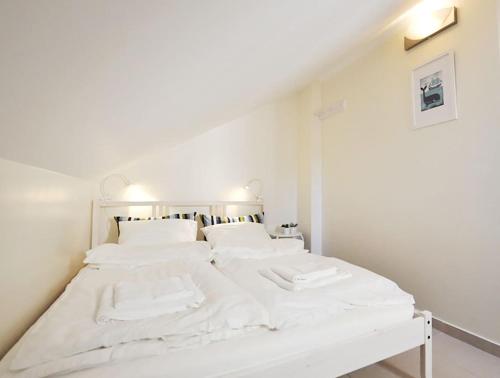 Postel nebo postele na pokoji v ubytování Casa Baleia - Praia e Piscina - 10 pessoas