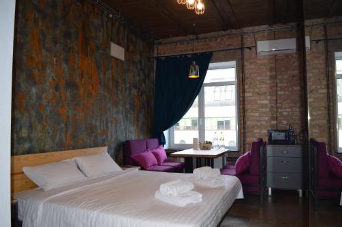 Posteľ alebo postele v izbe v ubytovaní Apartment Arena City Loft