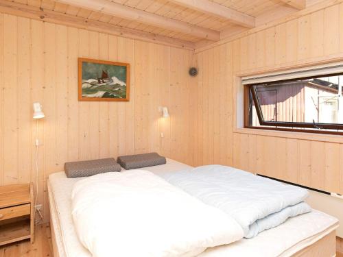 Postel nebo postele na pokoji v ubytování Holiday home Væggerløse CXII