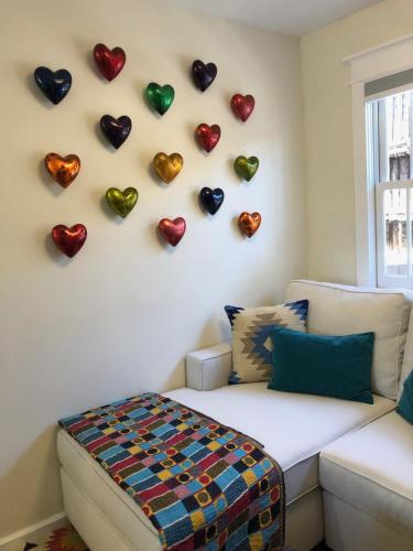 a room with hearts hanging on the wall at Casa Culinaria - The Gourmet Inn in Santa Fe