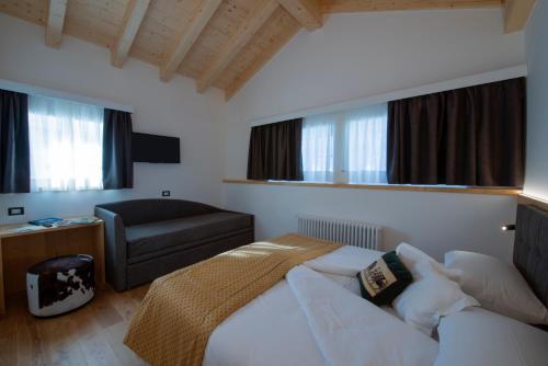 Cama o camas de una habitación en Hotel La Meridiana