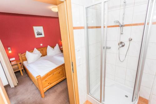 En eller flere senge i et værelse på Berghoam - inklusive Wasserwelt