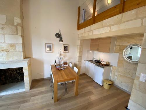 Kuchyň nebo kuchyňský kout v ubytování Appartement Saint Emilion