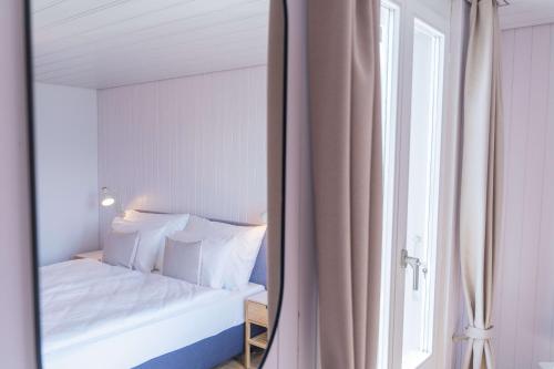 Postel nebo postele na pokoji v ubytování la belle vue Boutique Hotel & Café