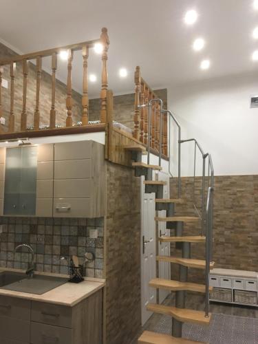 Kuchyňa alebo kuchynka v ubytovaní Móra apartmanház