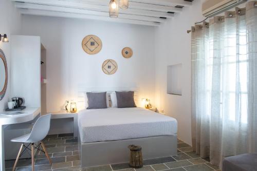 A bed or beds in a room at Villa Irini