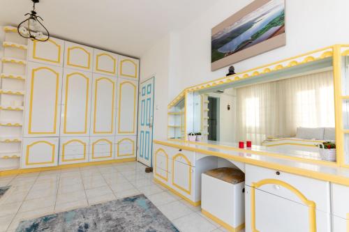 a bathroom with a sink and a mirror at Otto Home Sea View Private Apartment in Sogut village Marmaris in Sogut