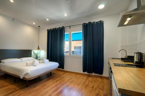 Postel nebo postele na pokoji v ubytování Hotelito Boutique Badalona Mar