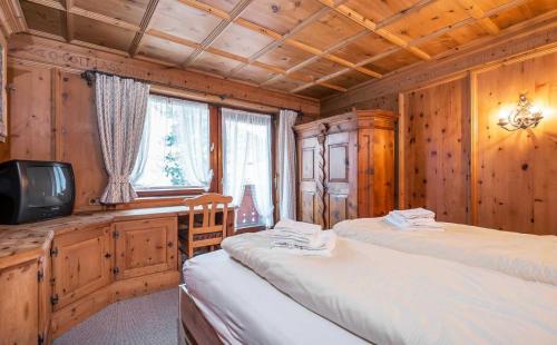Postel nebo postele na pokoji v ubytování Heart Hotel Talhof Nigg
