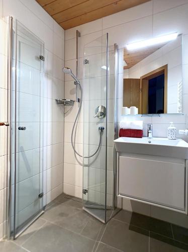 a bathroom with a shower and a sink at Haus Claudia Lipp in Bad Hindelang