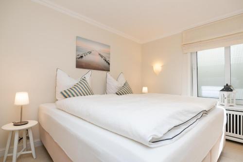 Postel nebo postele na pokoji v ubytování Appartement Lycka