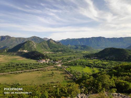 an aerial view of a valley with mountains in the background at Apartman Pavle 2 in Virpazar