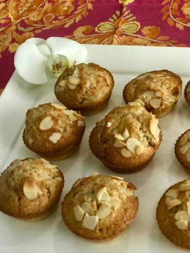 a white plate with muffins on a table at The Parkwood in Johannesburg