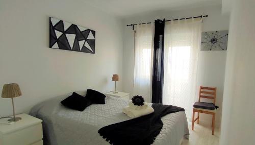 A bed or beds in a room at 1E Carvoeiro