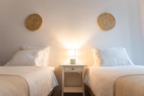 Postel nebo postele na pokoji v ubytování Sintra Chalet
