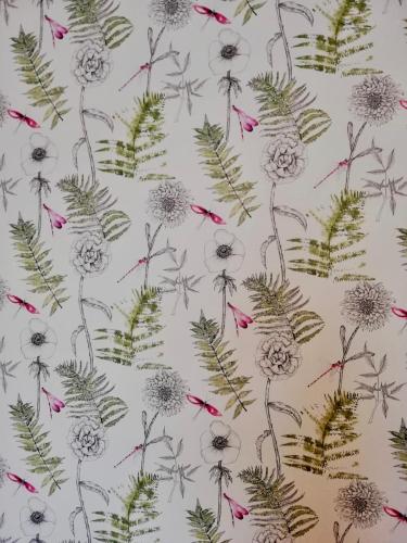 a pattern of flowers and birds on a white background at Relais Le Betulle in Conegliano