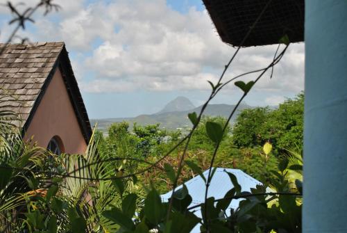 a view of the mountains from a house at Villa Caribbean Dream in Vieux Fort