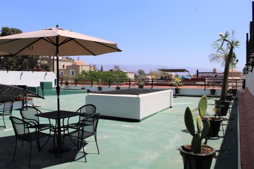 Casa Esmeralda Hotel tesisinde bir balkon veya teras