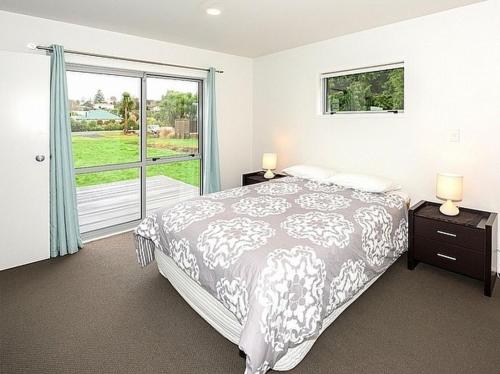 Katil atau katil-katil dalam bilik di Alta House - Ohakune Holiday House