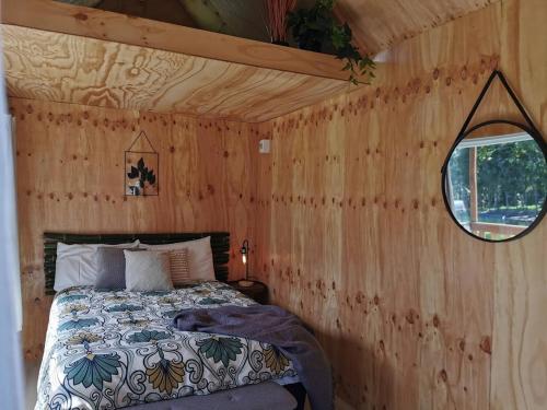Llit o llits en una habitació de Tui Lodge