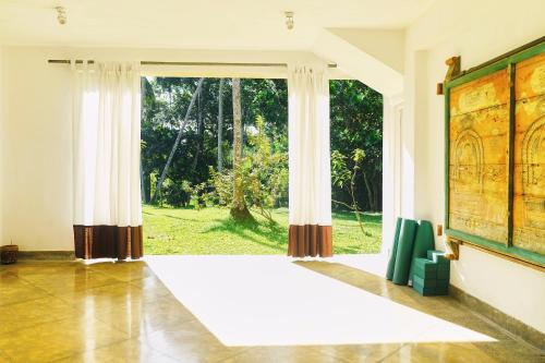 Samadara Estate, Midigamaにある庭