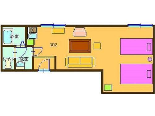 a floor plan of a small yellow house at Condominium Stella Site in Hakodate