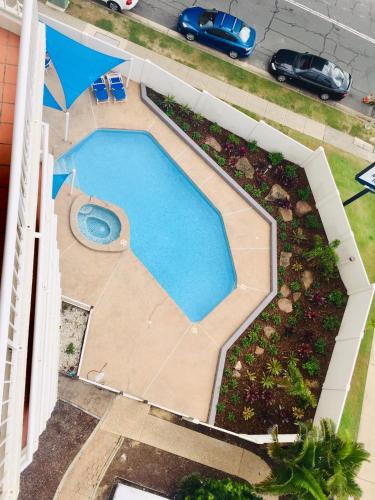 an overhead view of a swimming pool in a yard at Meridian Tower Kirra Beach in Gold Coast