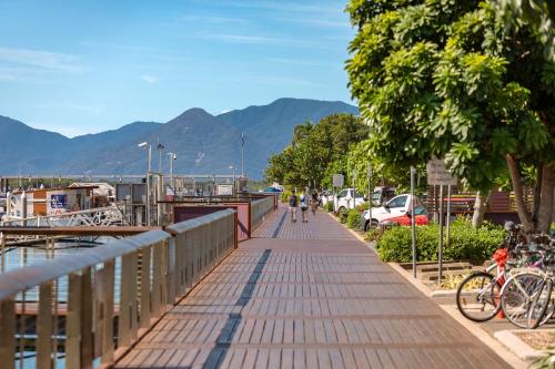 a walkway with a bike parked on a bridge at Piermonde Apartments Cairns in Cairns