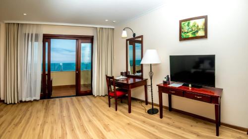 TV a/nebo společenská místnost v ubytování Sunny Beach Resort & Spa Mui Ne