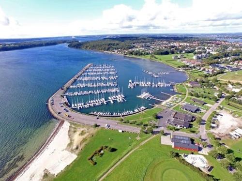 an aerial view of a marina with boats in the water at Fasanvej 3 Lille værelse in Middelfart