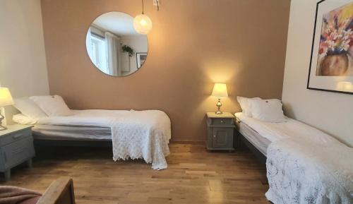 Ένα ή περισσότερα κρεβάτια σε δωμάτιο στο Lofoten Home Apartment