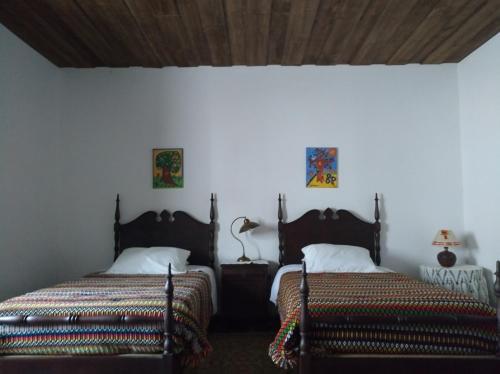 Cama o camas de una habitación en Casa da Tia Luísa